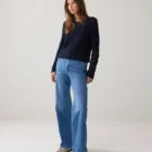 Fitted short jumper made of 100% cotton in a macramé look. Pairs well with a camisole or bralette underneath. Washing advice: we recommend washing this item in a laundry bag.