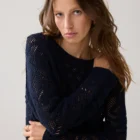 Fitted short jumper made of 100% cotton in a macramé look. Pairs well with a camisole or bralette underneath. Washing advice: we recommend washing this item in a laundry bag.