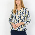 Description EN: SC-FELICITY AOP 534 Blouse is made from 50% Organic cotton, 50% Viscose. It features a round neckline, an abstract print and mid-length sleeves. Pair it with tailored trousers or jeans for a unique and elegant look.